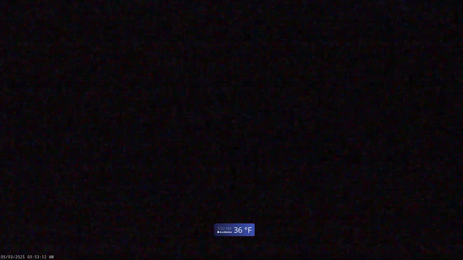 A completely dark nighttime scene with a temperature of 36 degrees Fahrenheit.