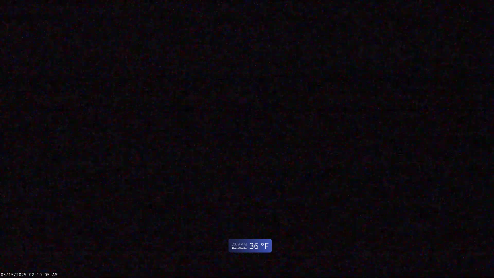 A completely dark nighttime scene with a temperature of 36 degrees Fahrenheit.