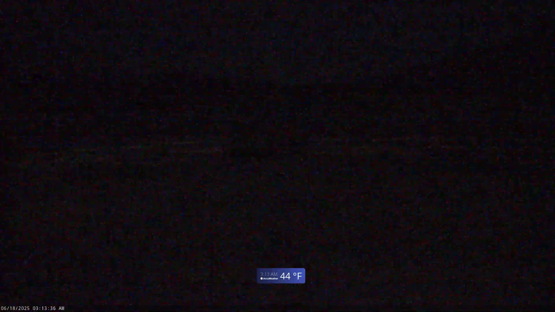 A dark, nighttime scene with a temperature of 44°F.