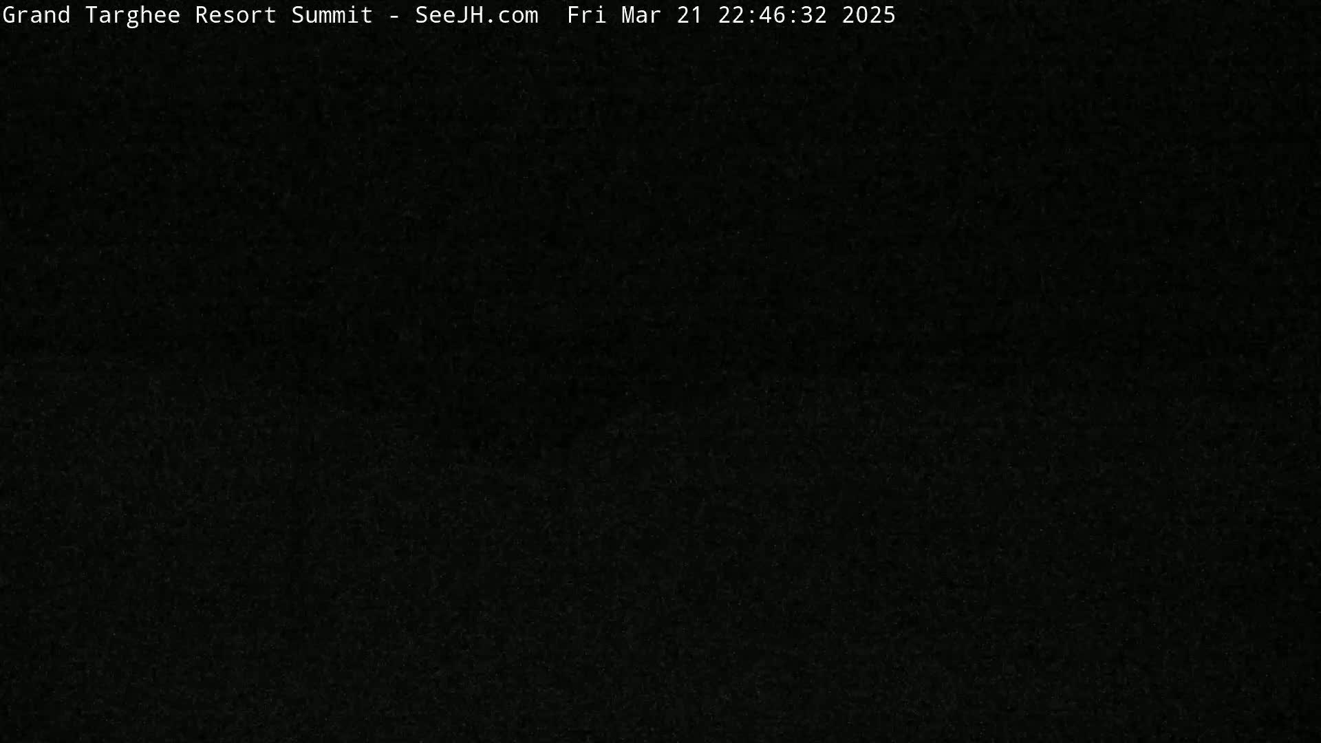 A completely dark image is shown, possibly due to nighttime or poor lighting conditions.