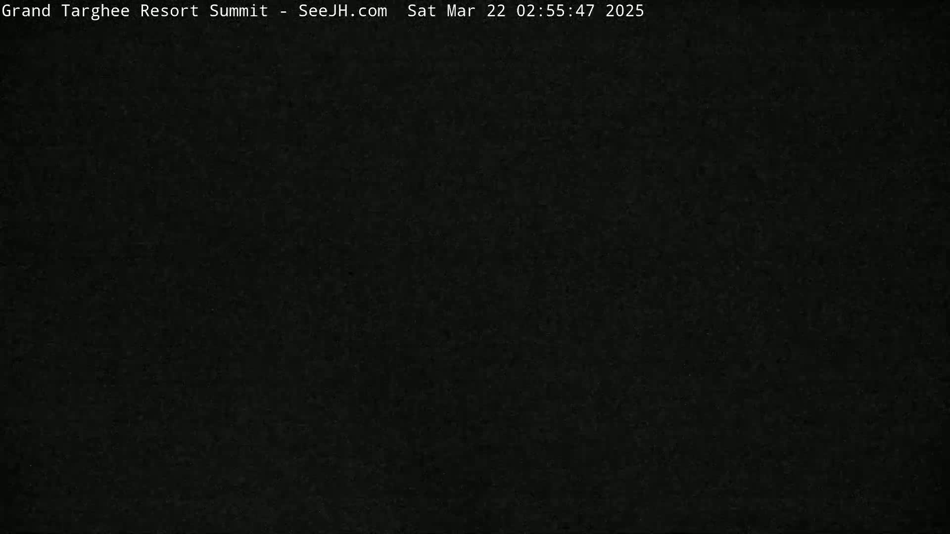 The image is a completely dark, uniformly textured black.