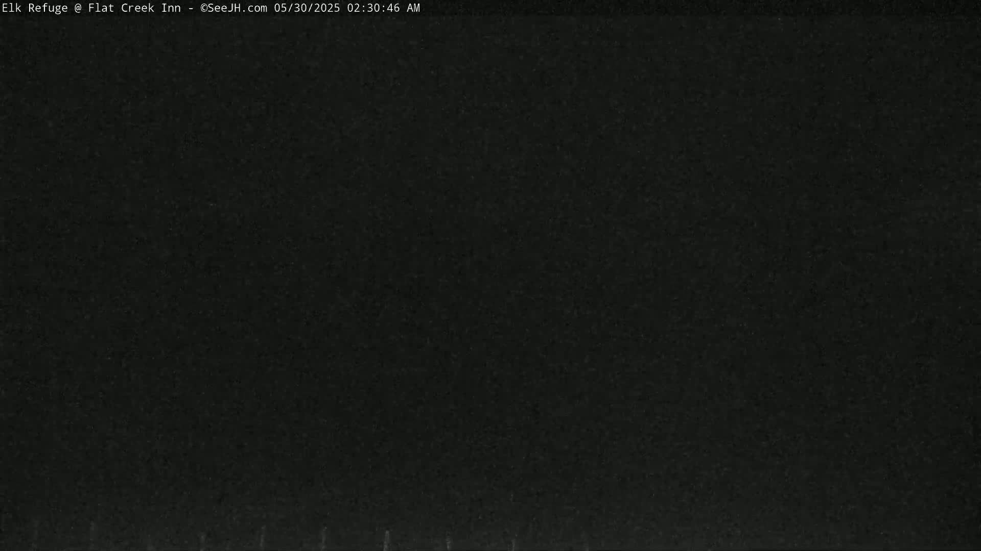 The image shows a completely dark, solid black screen.