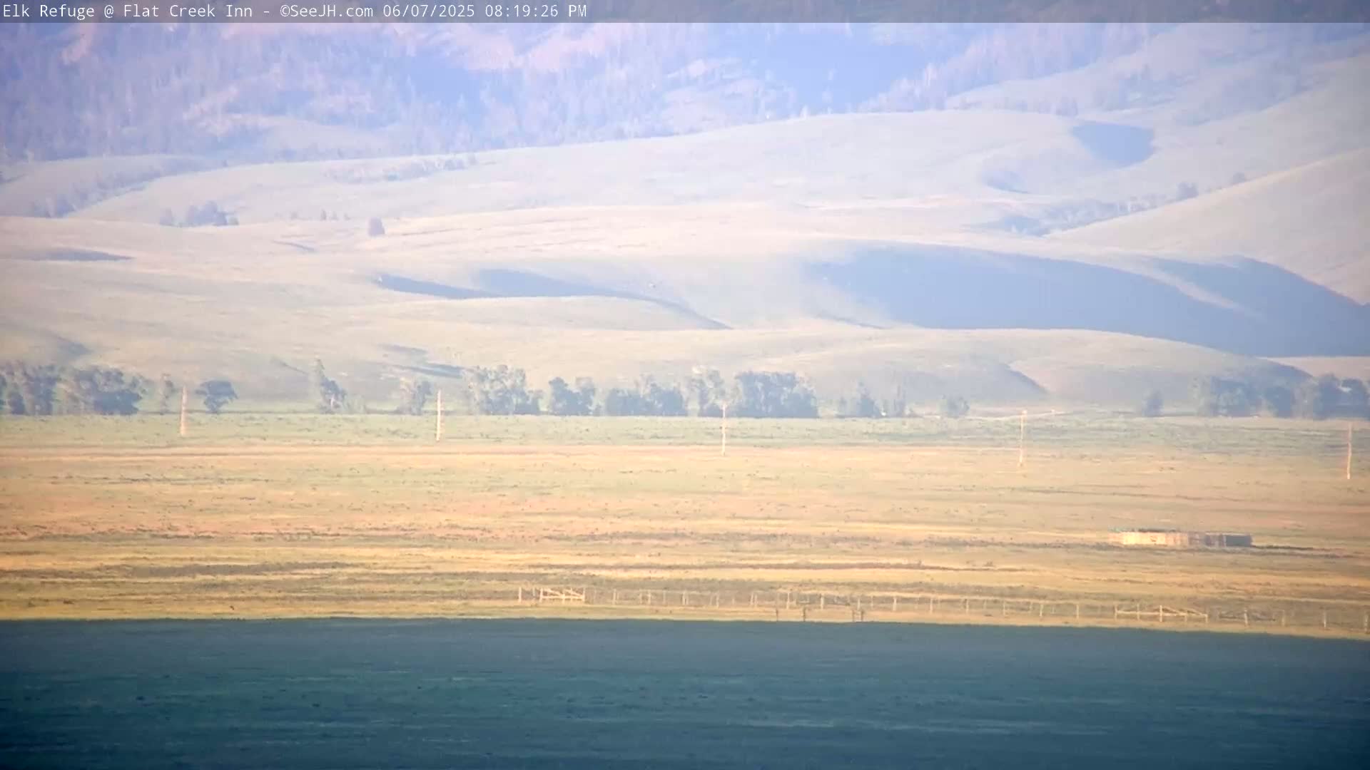 Jackson, Elk Refuge & Teton Mountains from Flat Creek Inn Live Cam - Jackson, Teton, Wyoming, USA