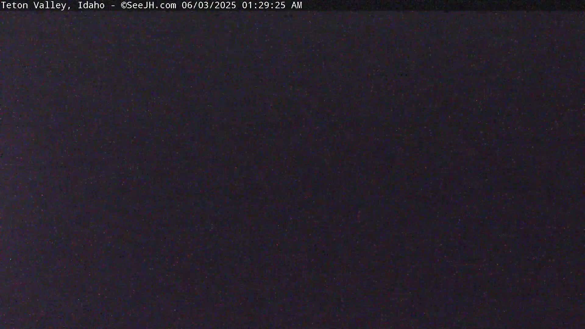 The image shows a dark, nighttime scene.