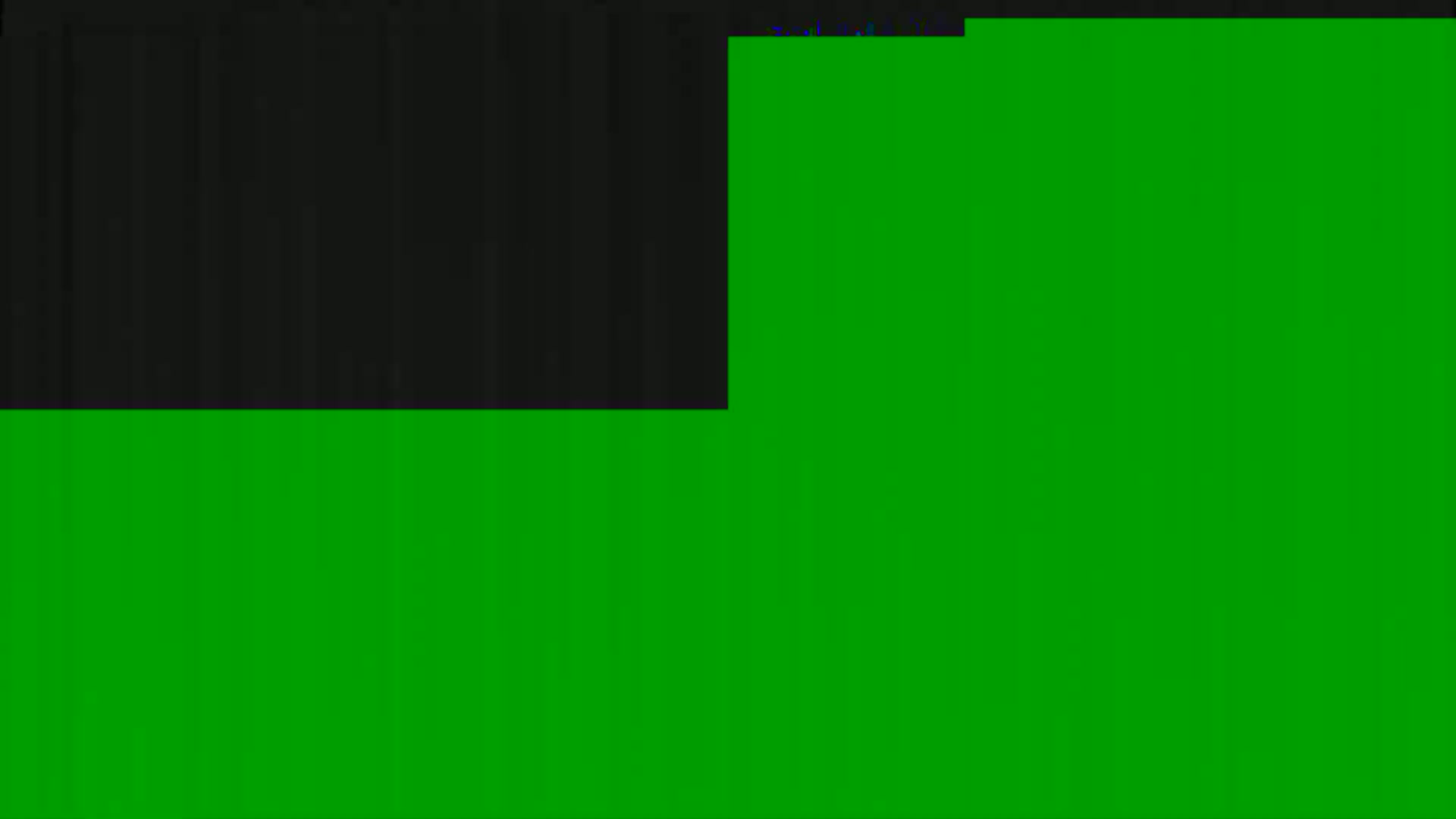 The image shows a mostly green surface with a smaller black section at the top left.