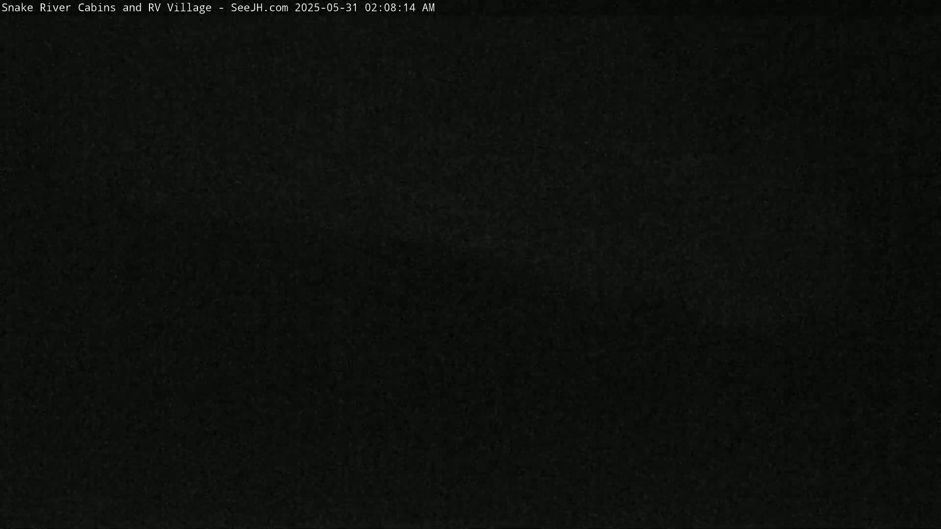 The image shows a completely dark scene.