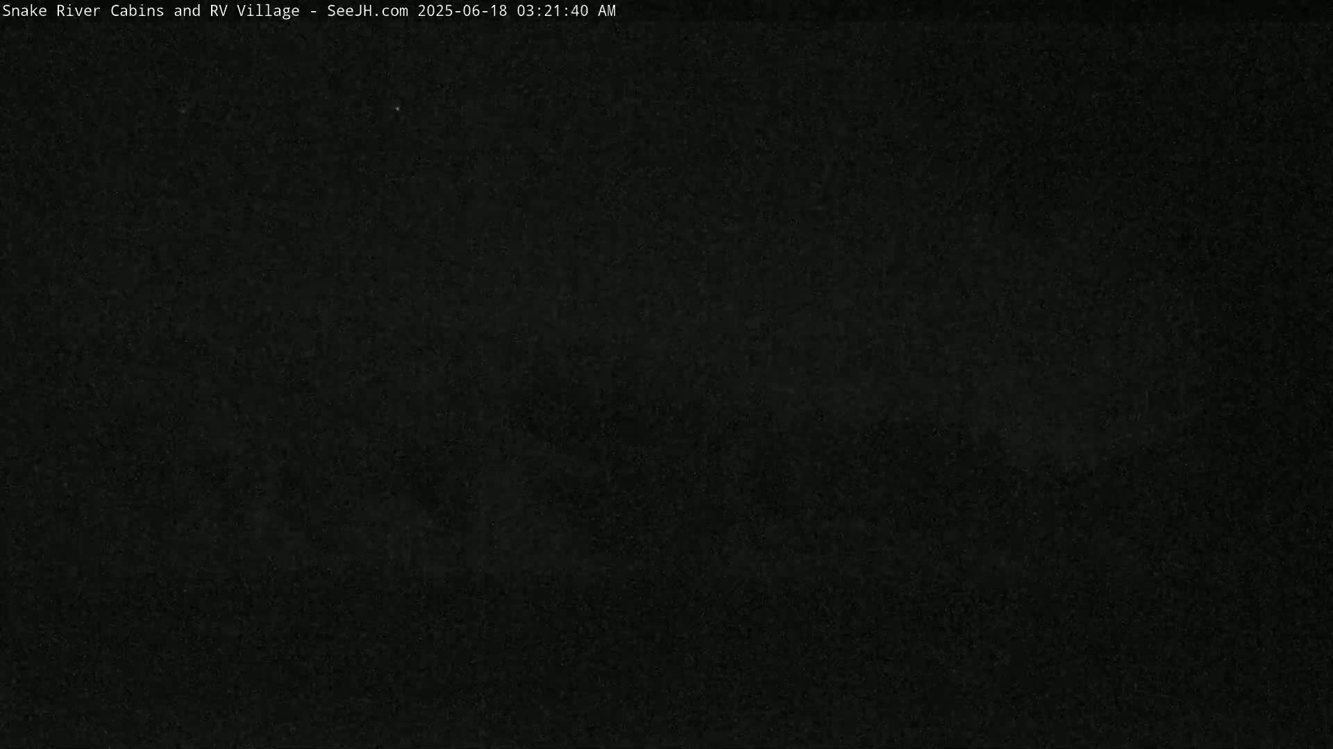 The image shows a completely dark, possibly nighttime, scene.