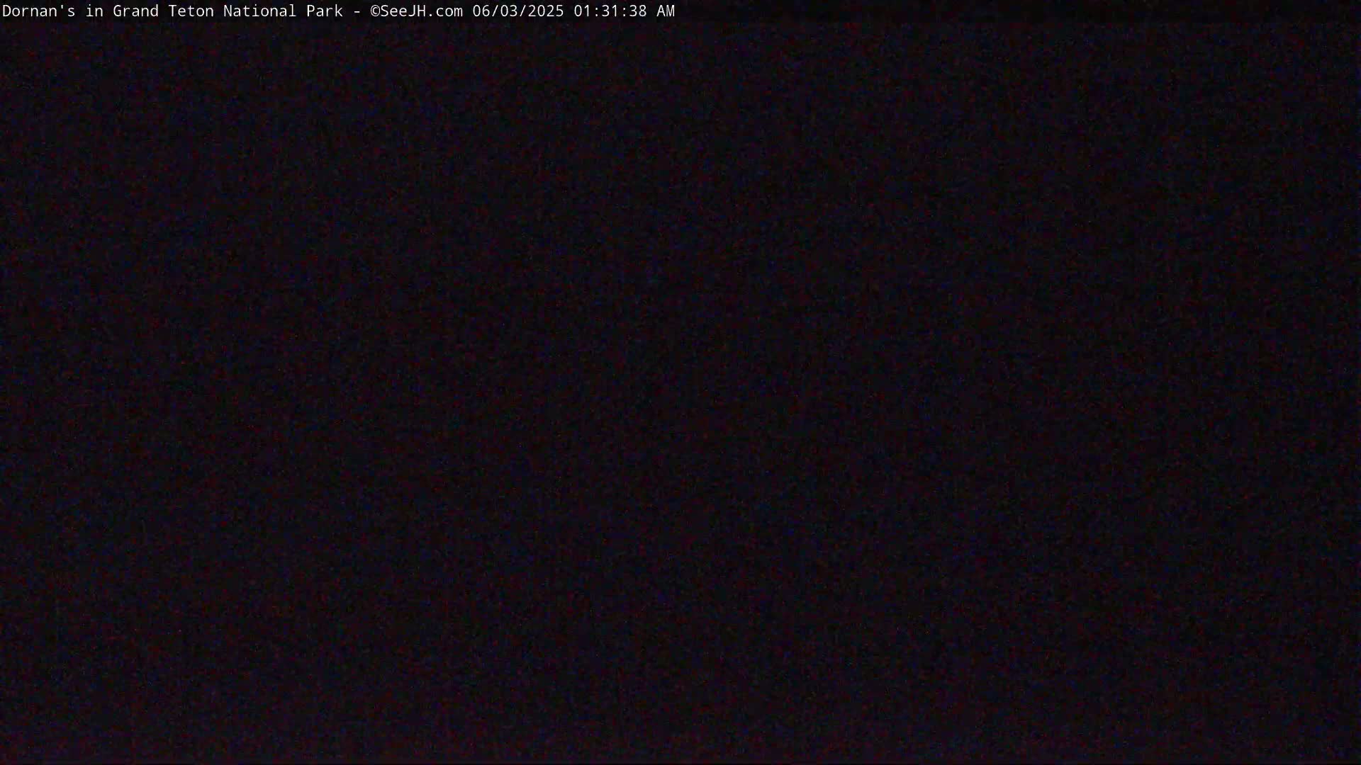 The image shows a completely dark scene.