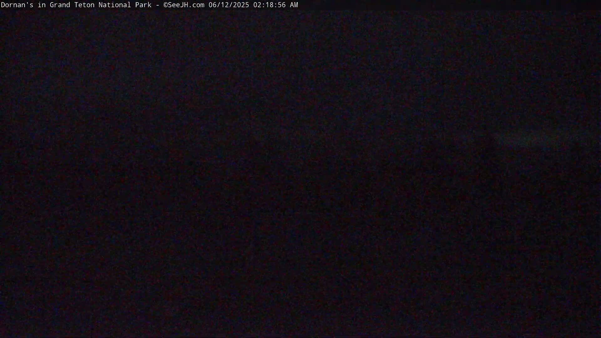 The image shows a completely dark scene, likely at night.