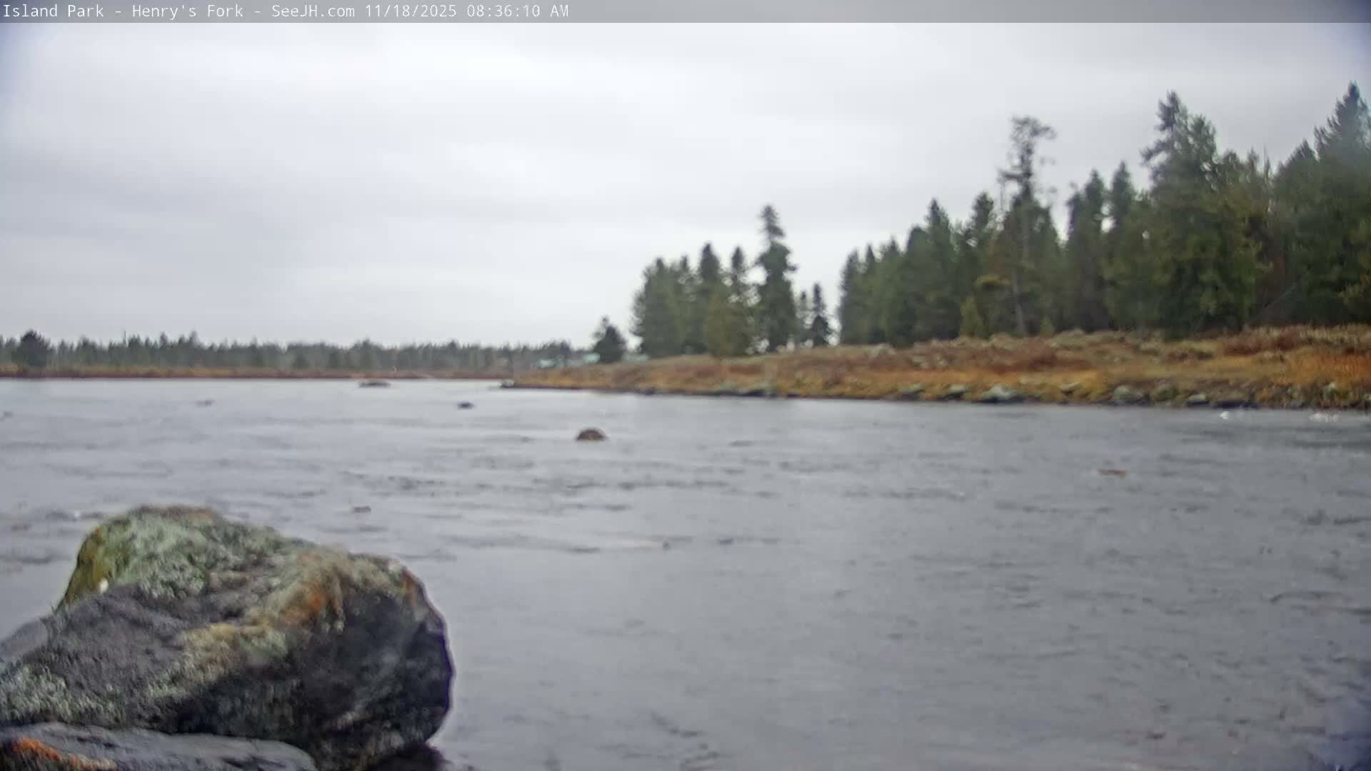 Two distinct bright lights are visible against a completely dark background under clear nighttime conditions.