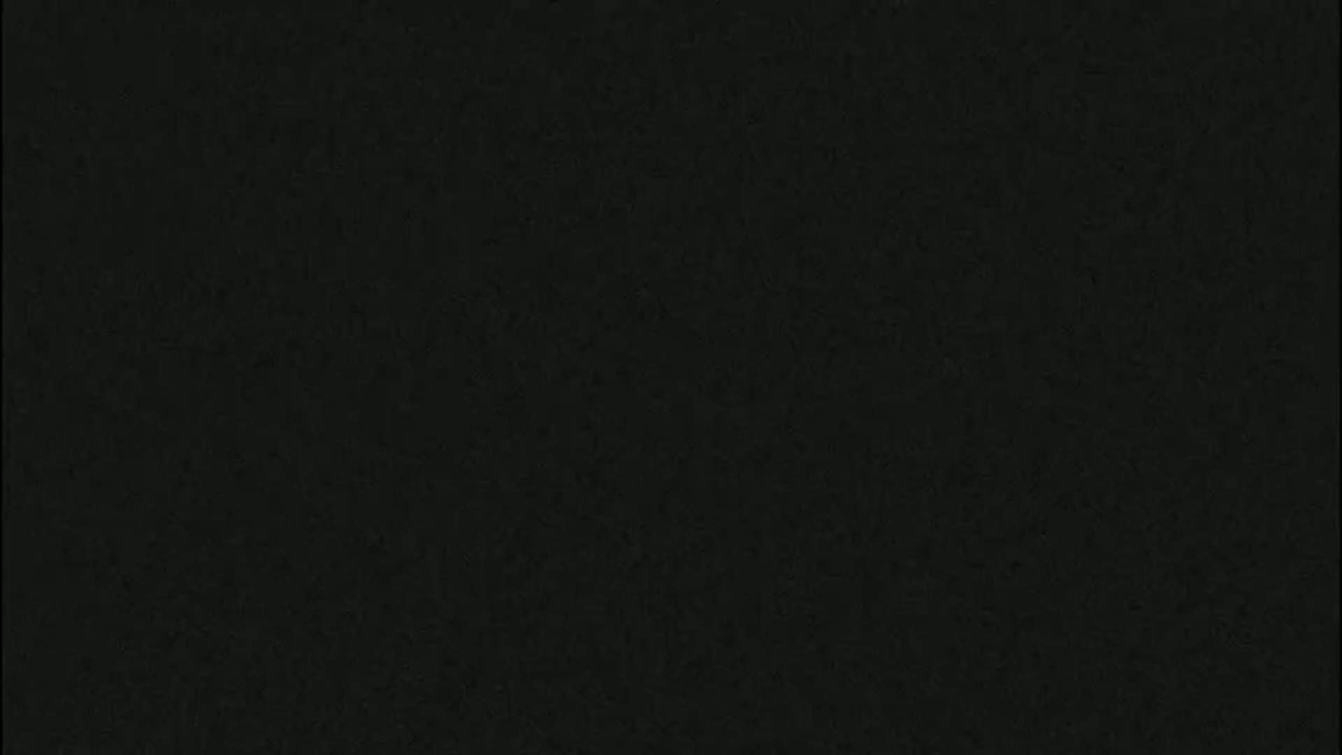 The image is a solid dark gray or black.