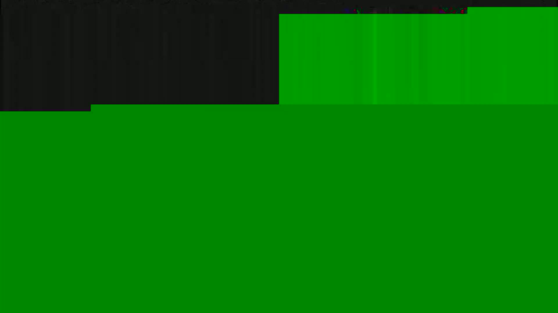 The image shows a mostly green screen with a smaller black section at the top.