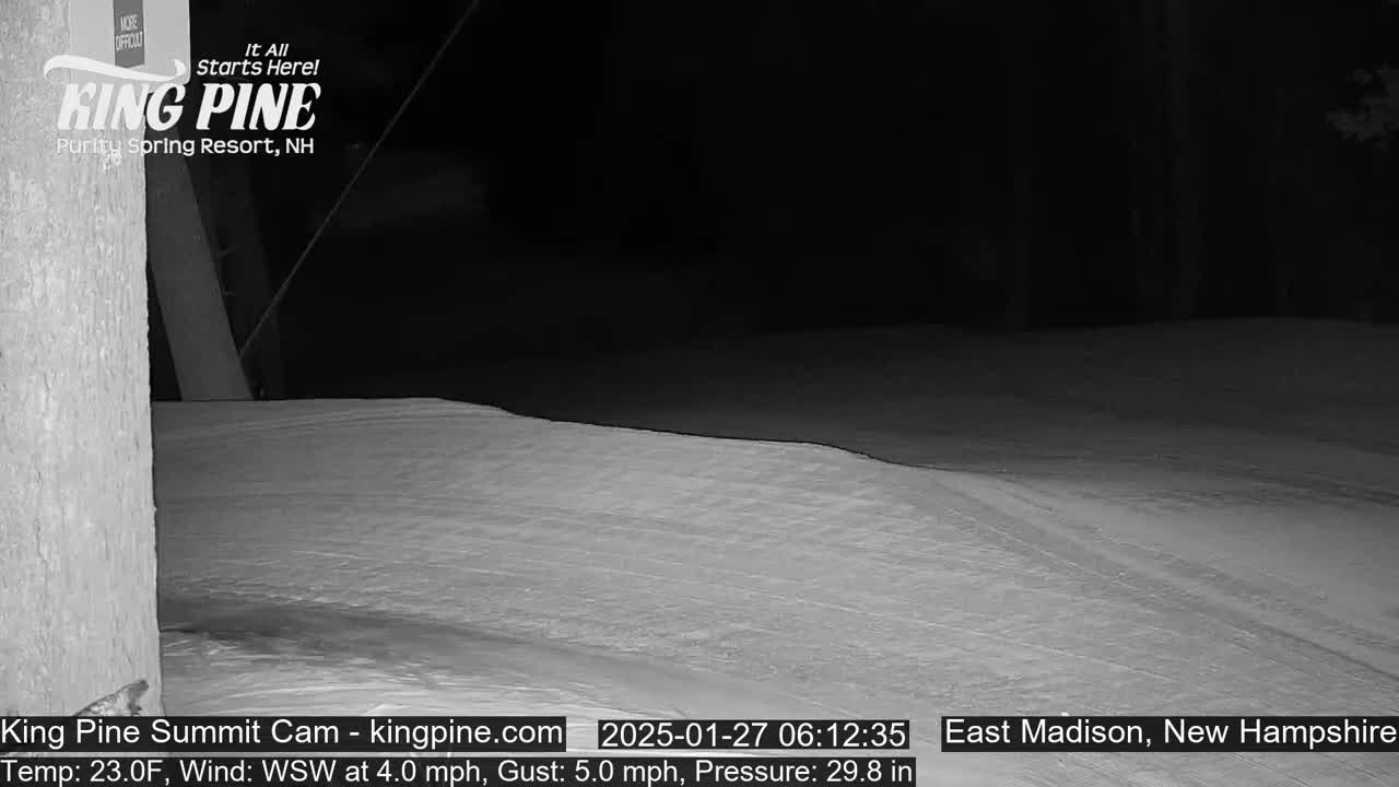 A nighttime view of a snow-covered slope under a dark sky with a wind of 4 mph from the west-southwest, gusting to 5 mph.