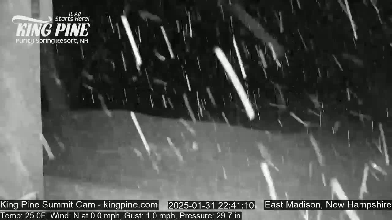 Snow falls heavily at night.