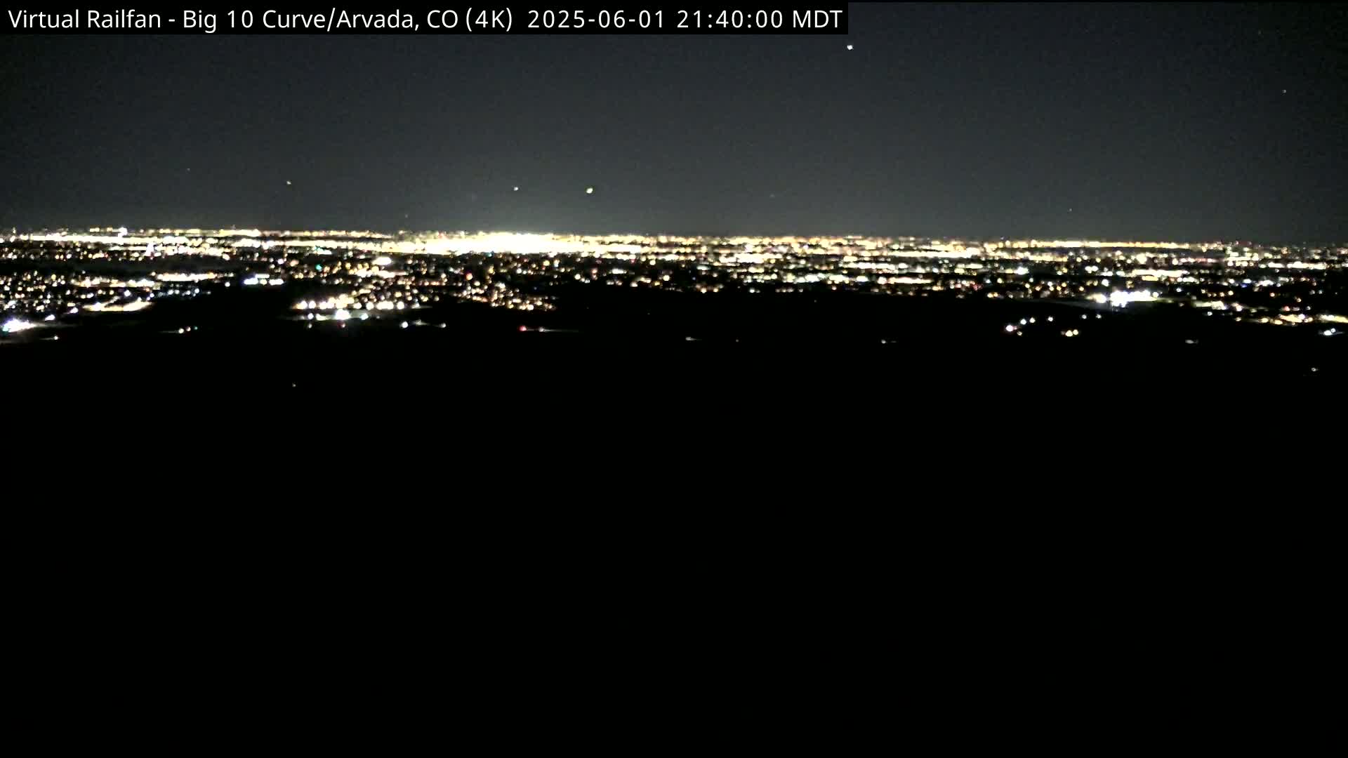 Denver Skyline  & Arvada Big  10 Curve Railroad Live Cam - Arvada, Jefferson, Colorado, USA