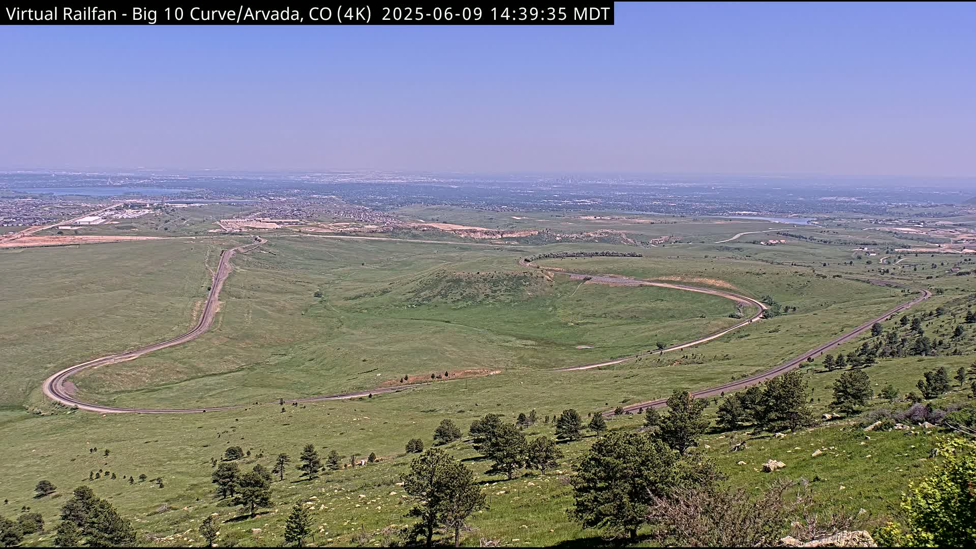 Denver Skyline  & Arvada Big  10 Curve Railroad Live Cam - Arvada, Jefferson, Colorado, USA