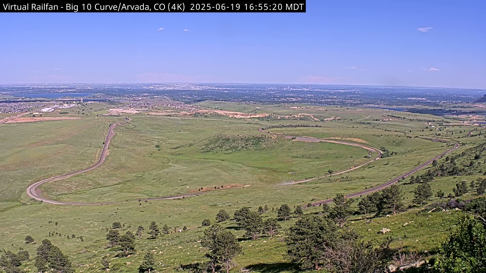 Denver Skyline  & Arvada Big  10 Curve Railroad Live Cam - Arvada, Jefferson, Colorado, USA