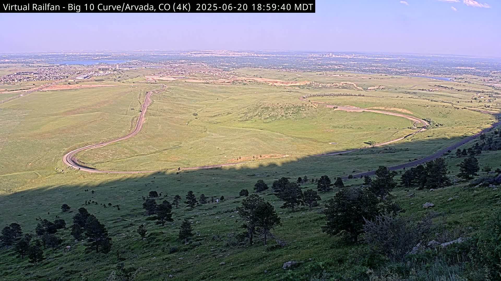 Denver Skyline  & Arvada Big  10 Curve Railroad Live Cam - Arvada, Jefferson, Colorado, USA