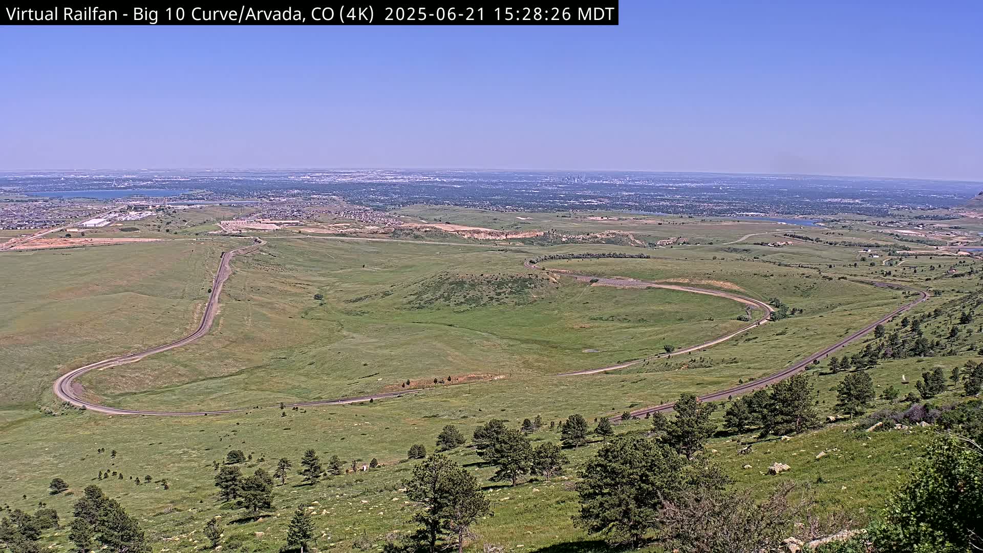 Denver Skyline  & Arvada Big  10 Curve Railroad Live Cam - Arvada, Jefferson, Colorado, USA