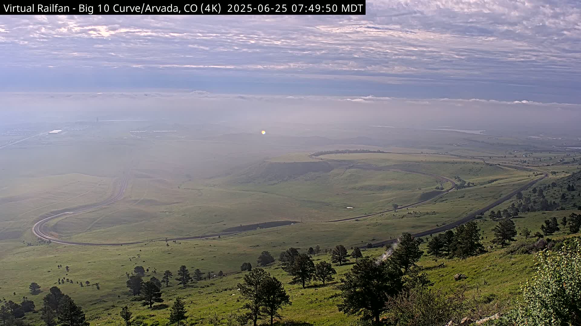 Denver Skyline  & Arvada Big  10 Curve Railroad Live Cam - Arvada, Jefferson, Colorado, USA