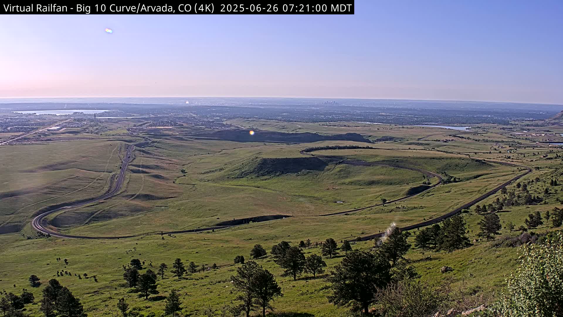 Denver Skyline  & Arvada Big  10 Curve Railroad Live Cam - Arvada, Jefferson, Colorado, USA