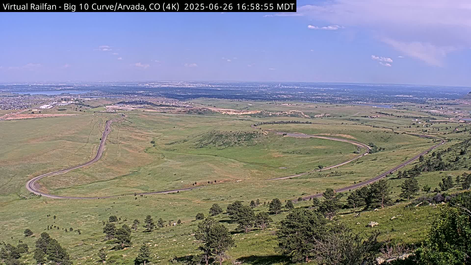 Denver Skyline  & Arvada Big  10 Curve Railroad Live Cam - Arvada, Jefferson, Colorado, USA