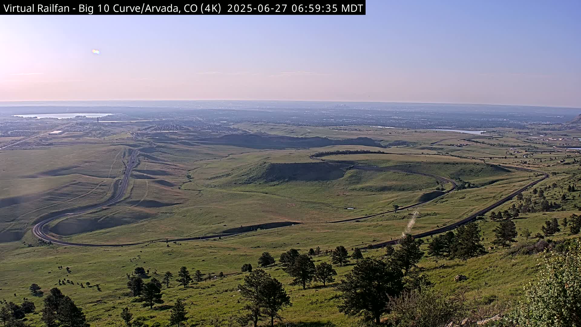 Denver Skyline  & Arvada Big  10 Curve Railroad Live Cam - Arvada, Jefferson, Colorado, USA