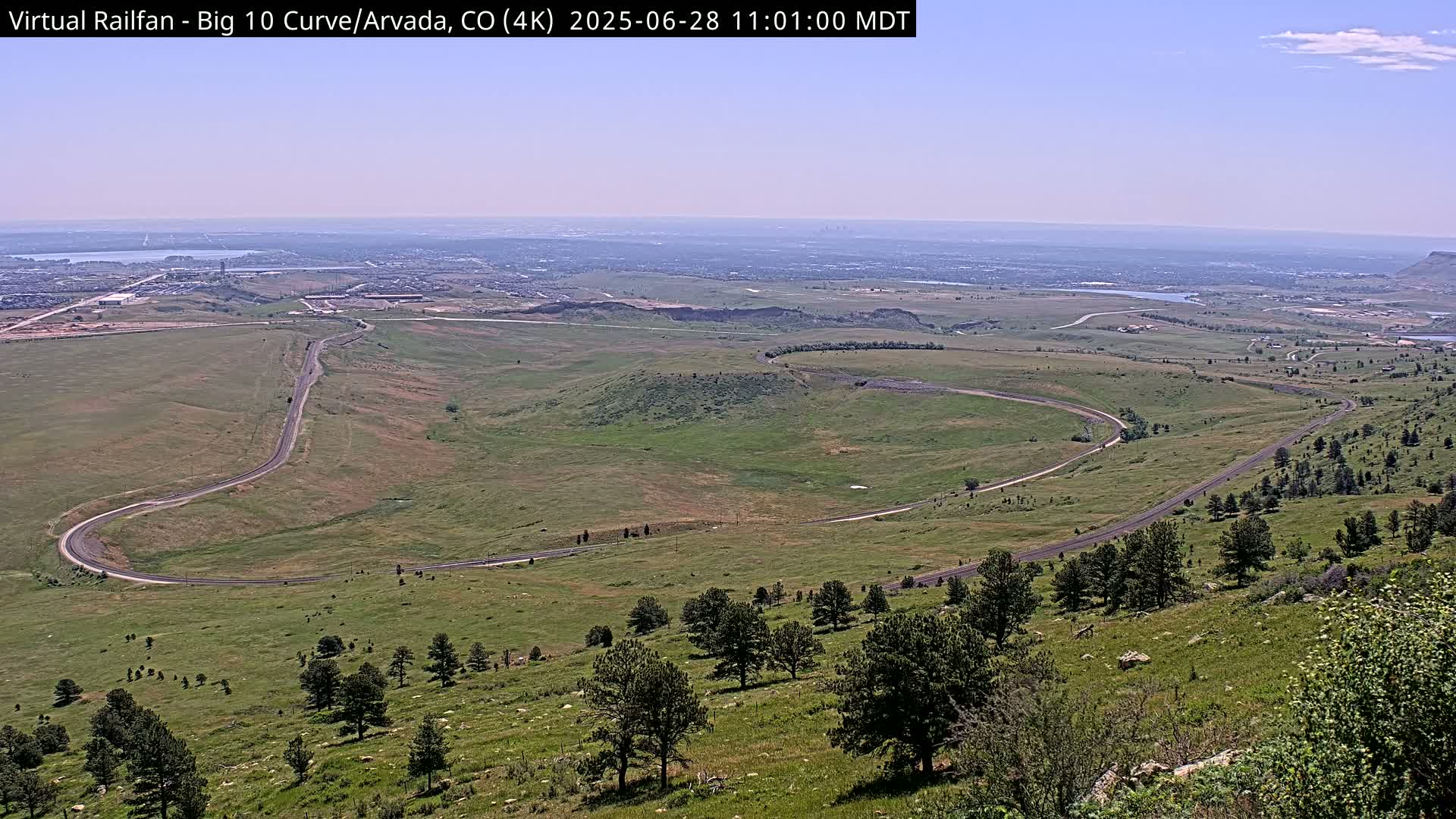 Denver Skyline  & Arvada Big  10 Curve Railroad Live Cam - Arvada, Jefferson, Colorado, USA