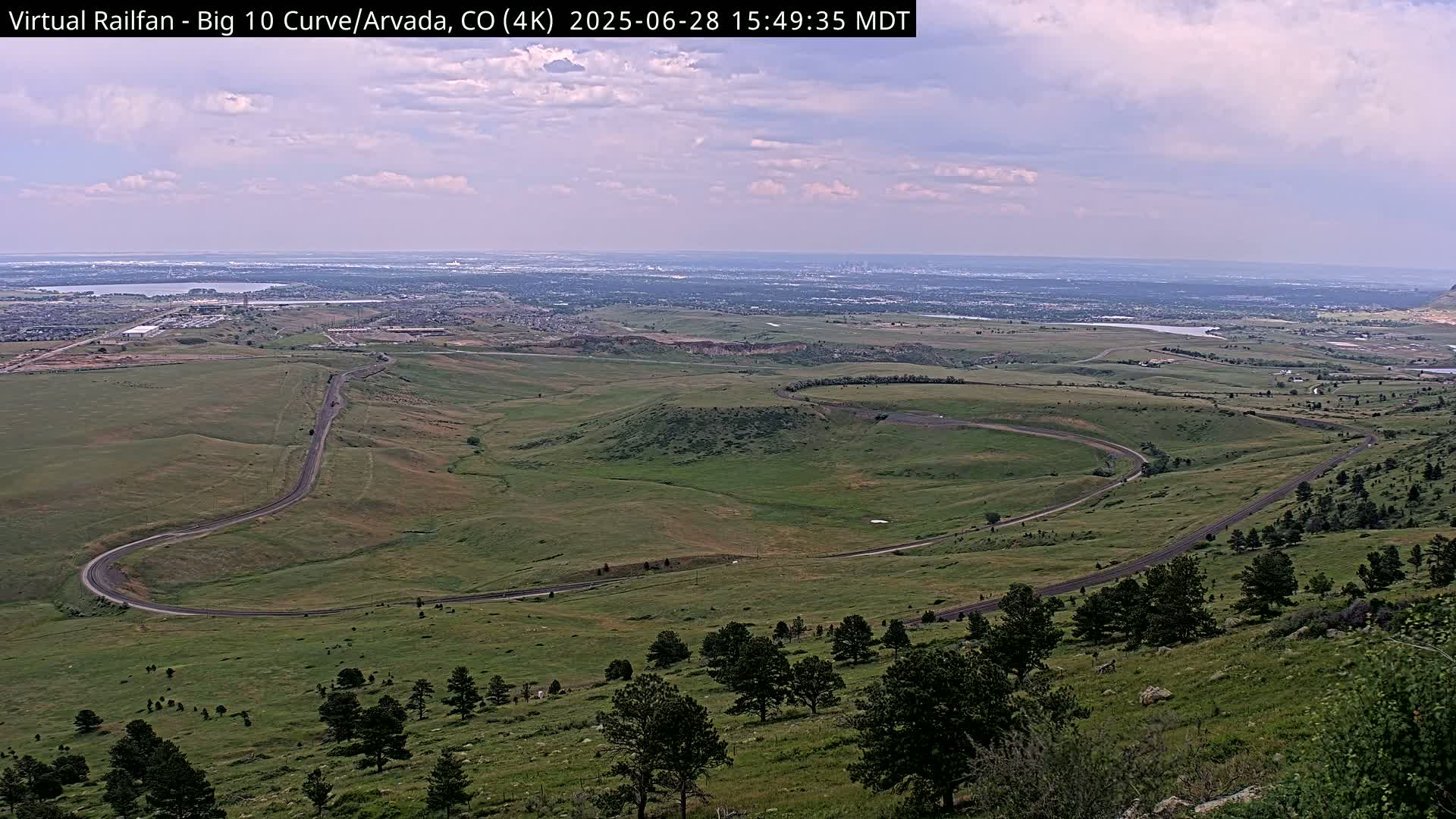 Denver Skyline  & Arvada Big  10 Curve Railroad Live Cam - Arvada, Jefferson, Colorado, USA