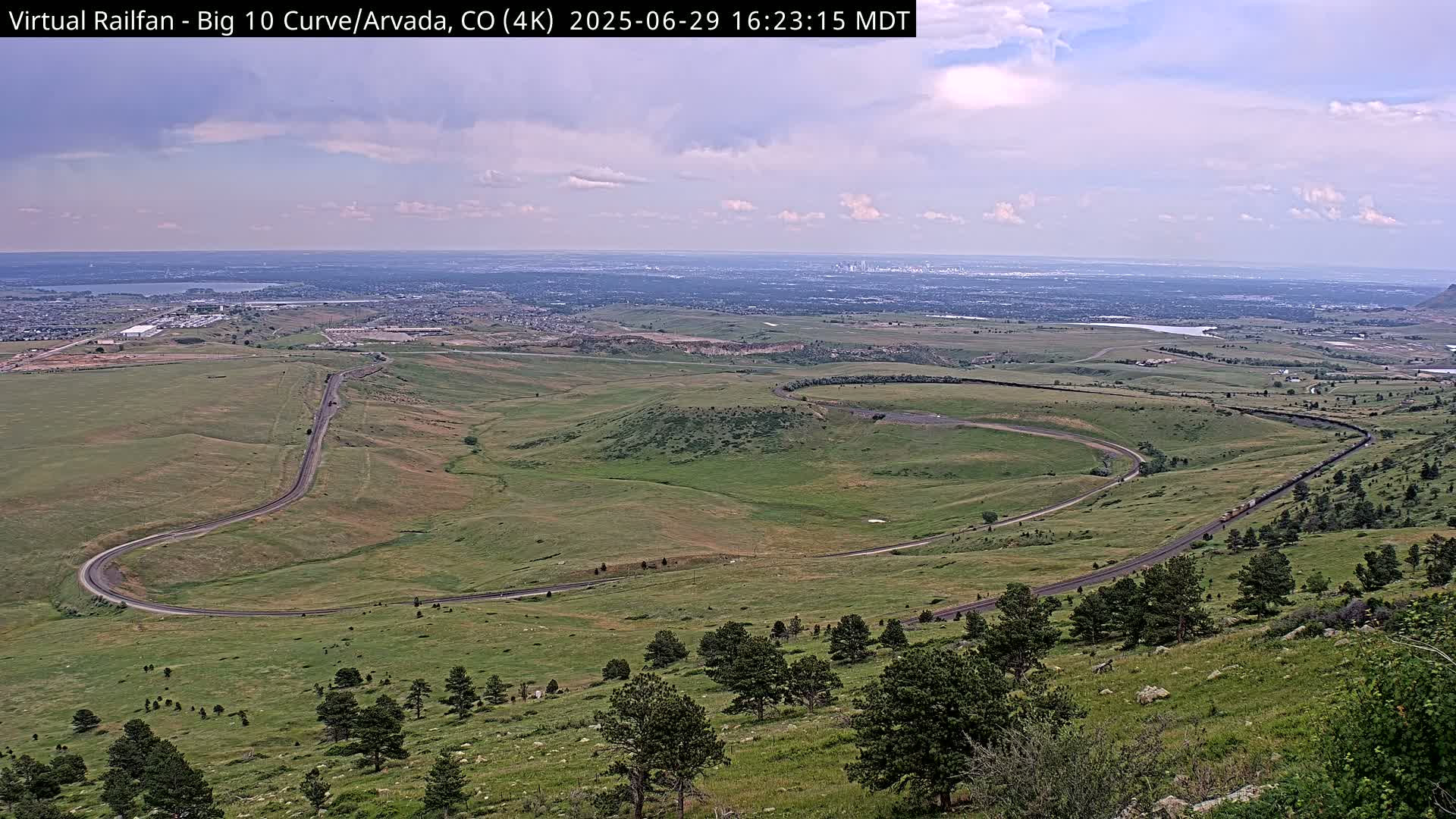 Denver Skyline  & Arvada Big  10 Curve Railroad Live Cam - Arvada, Jefferson, Colorado, USA