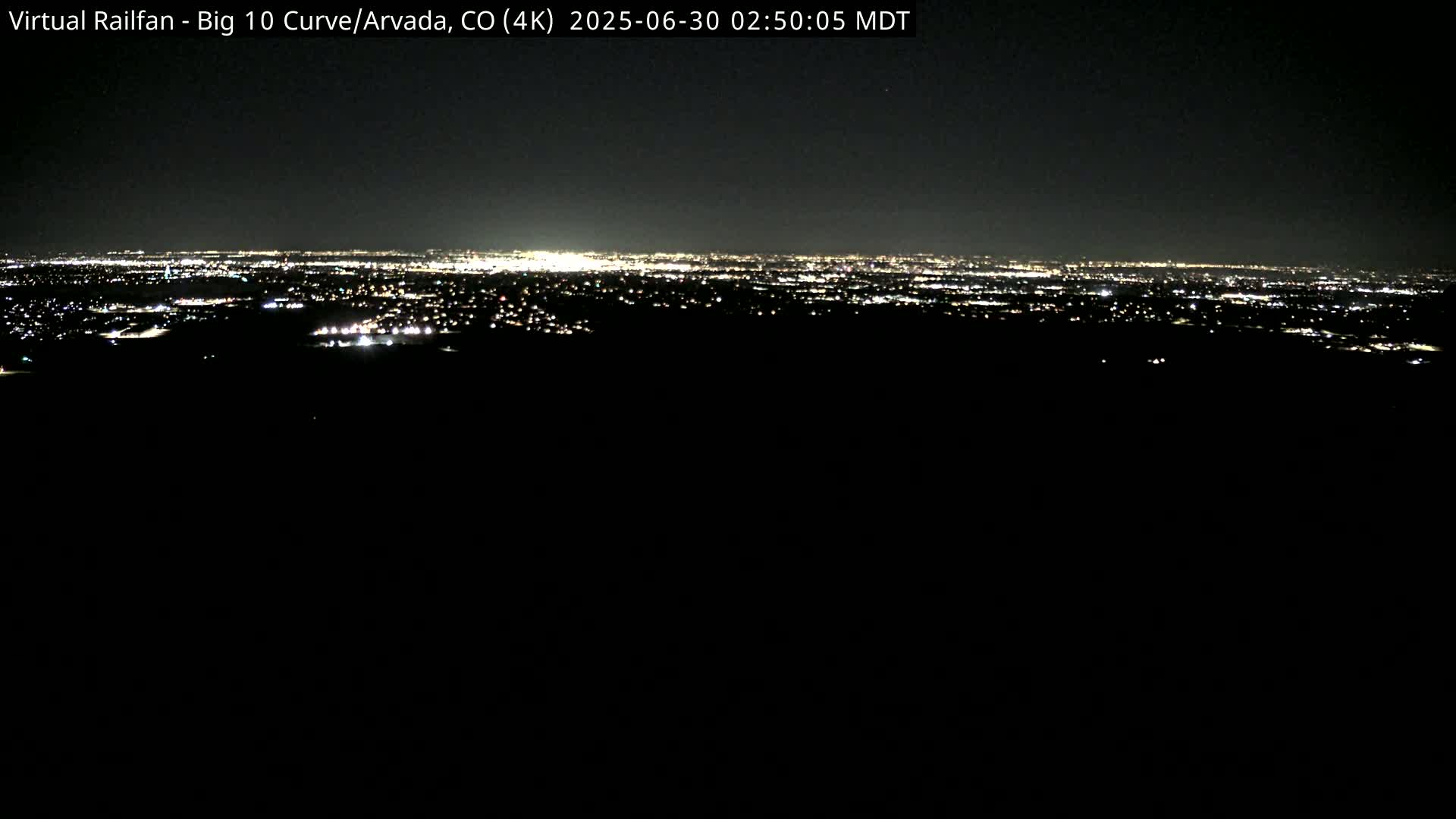 Denver Skyline  & Arvada Big  10 Curve Railroad Live Cam - Arvada, Jefferson, Colorado, USA