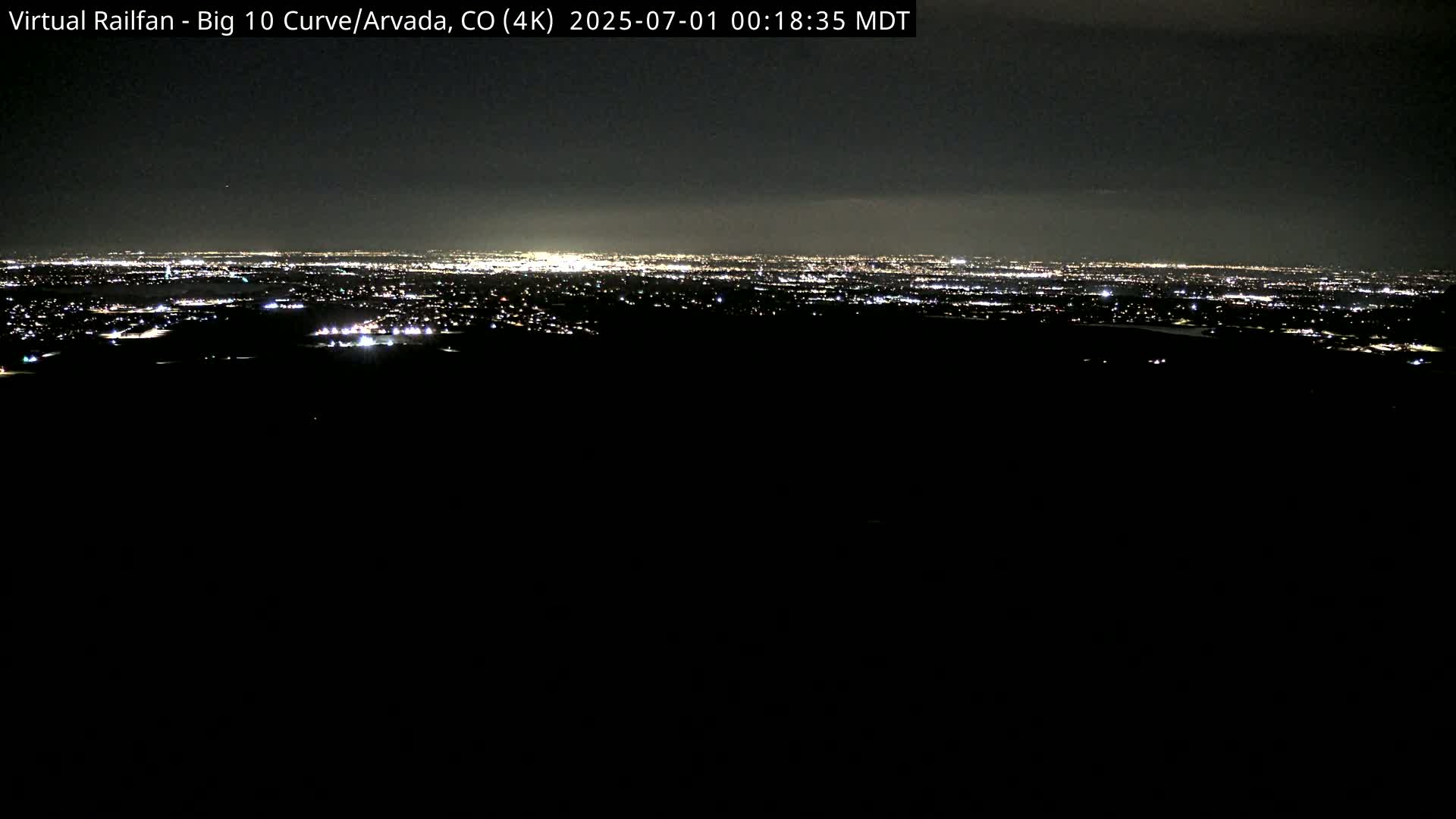 Denver Skyline  & Arvada Big  10 Curve Railroad Live Cam - Arvada, Jefferson, Colorado, USA
