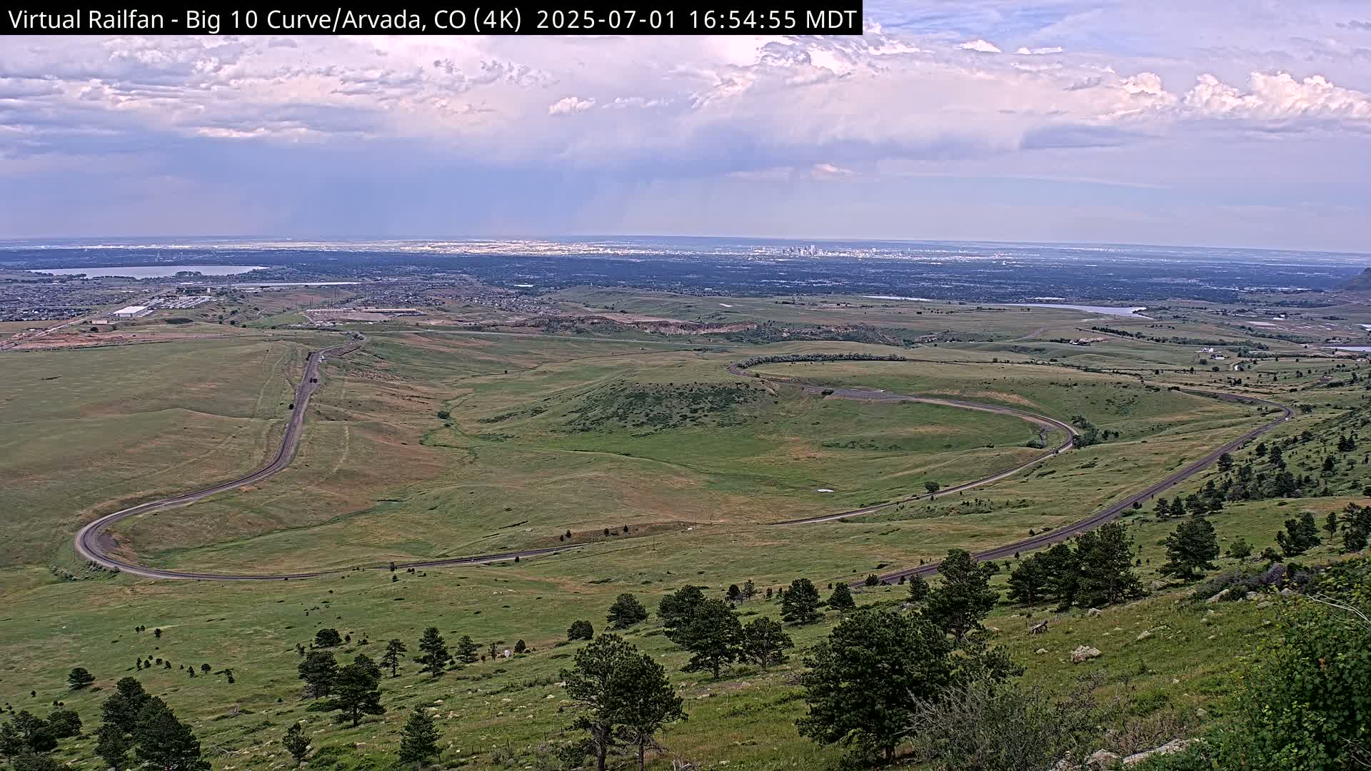 Denver Skyline  & Arvada Big  10 Curve Railroad Live Cam - Arvada, Jefferson, Colorado, USA