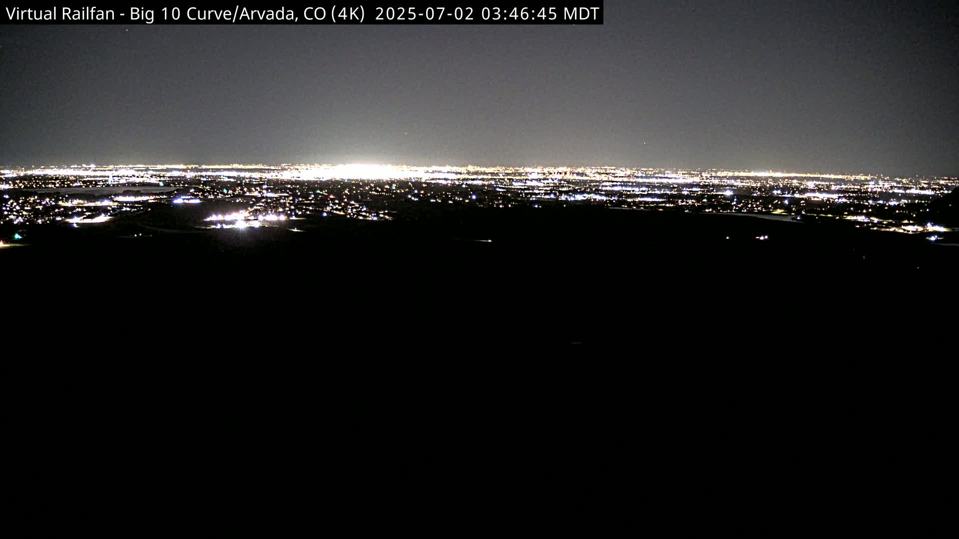 Denver Skyline  & Arvada Big  10 Curve Railroad Live Cam - Arvada, Jefferson, Colorado, USA