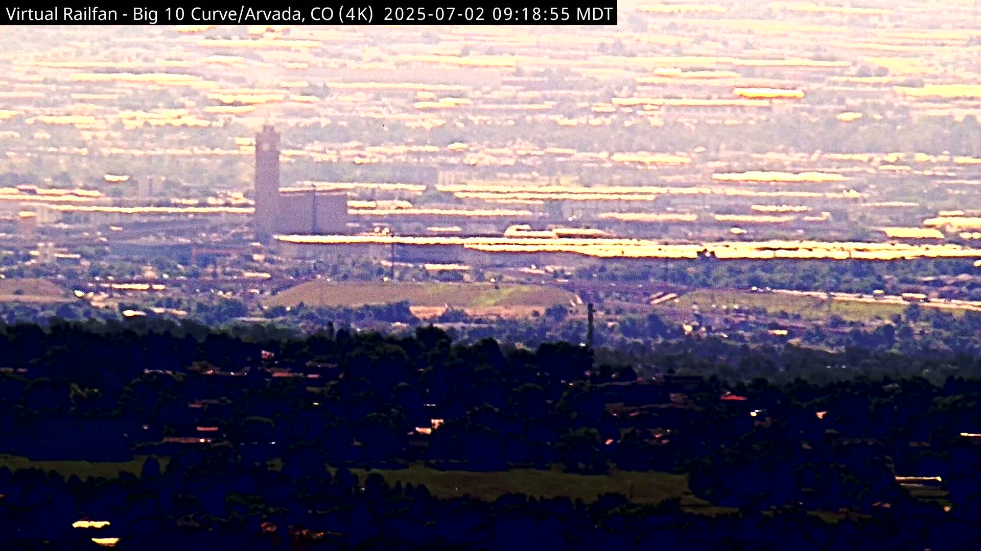 Denver Skyline  & Arvada Big  10 Curve Railroad Live Cam - Arvada, Jefferson, Colorado, USA