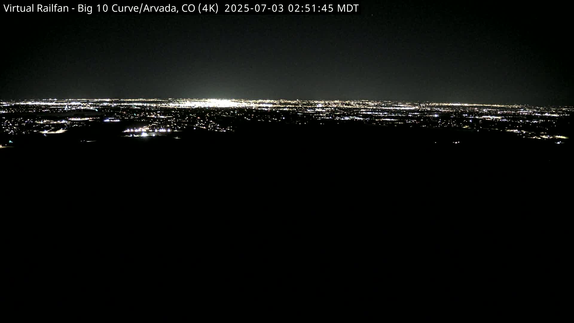 Denver Skyline  & Arvada Big  10 Curve Railroad Live Cam - Arvada, Jefferson, Colorado, USA
