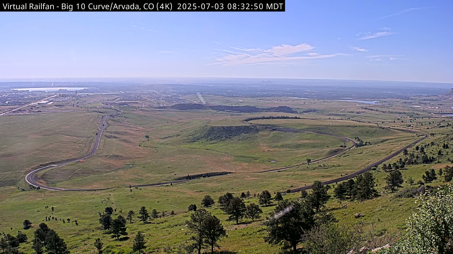 Denver Skyline  & Arvada Big  10 Curve Railroad Live Cam - Arvada, Jefferson, Colorado, USA