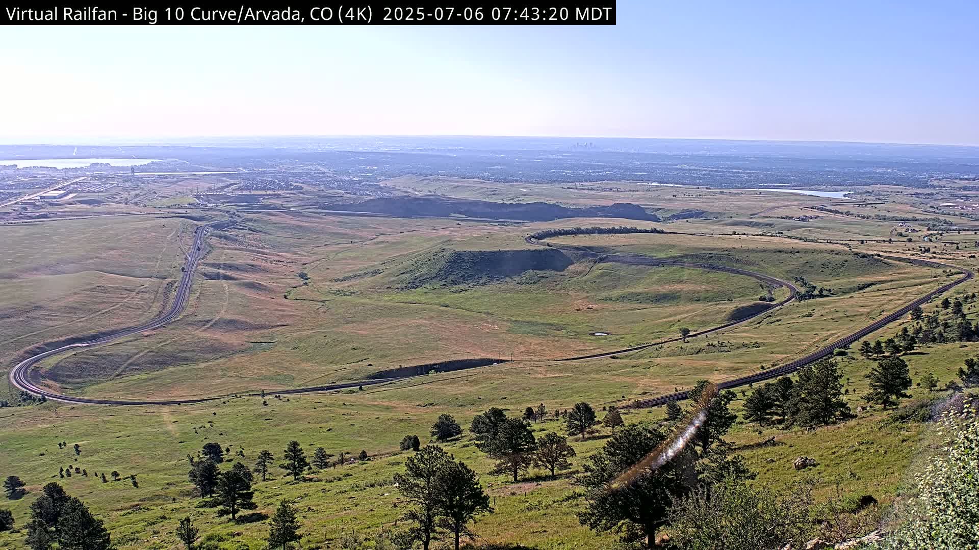 Denver Skyline  & Arvada Big  10 Curve Railroad Live Cam - Arvada, Jefferson, Colorado, USA