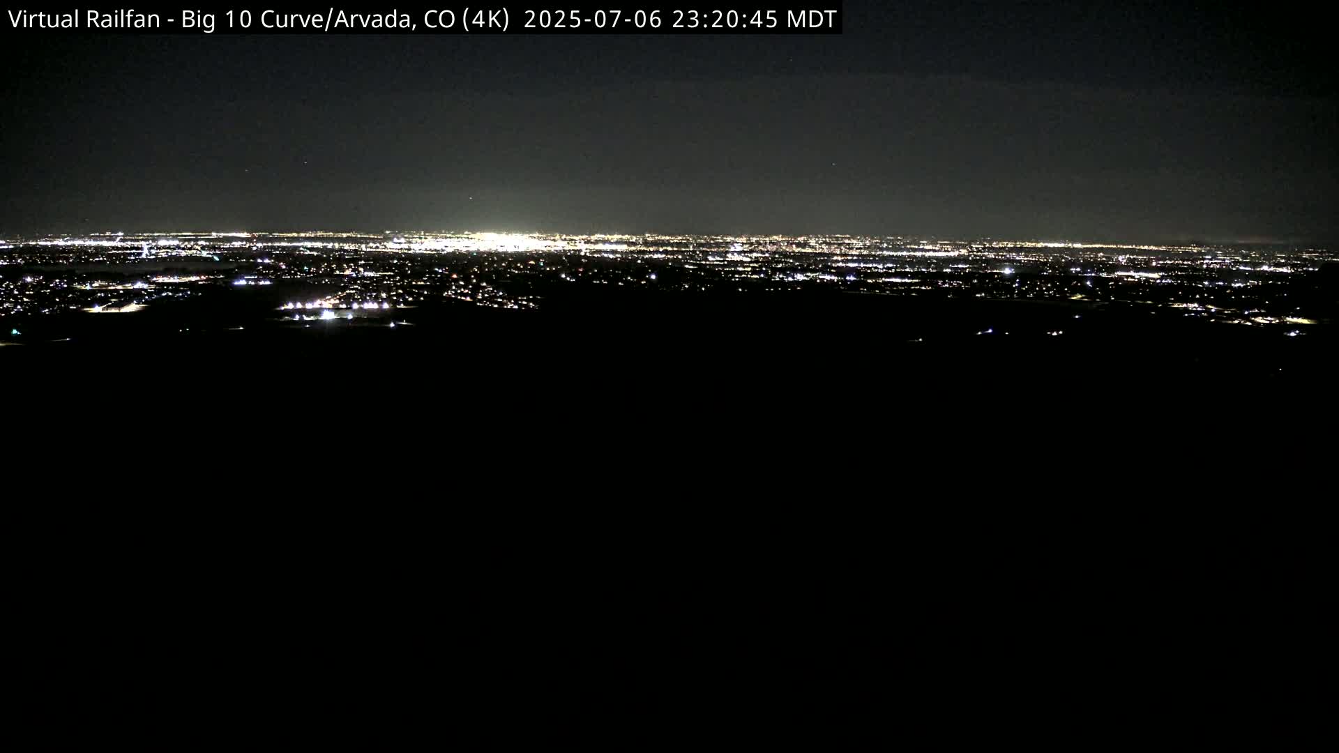 Denver Skyline  & Arvada Big  10 Curve Railroad Live Cam - Arvada, Jefferson, Colorado, USA