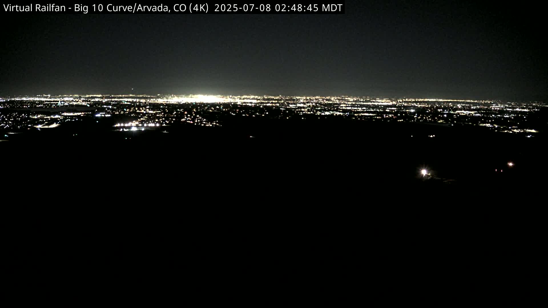 Denver Skyline  & Arvada Big  10 Curve Railroad Live Cam - Arvada, Jefferson, Colorado, USA