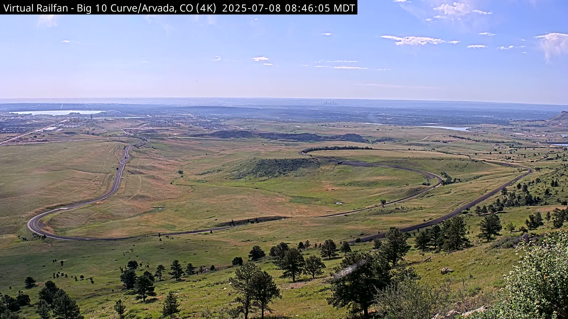 Denver Skyline  & Arvada Big  10 Curve Railroad Live Cam - Arvada, Jefferson, Colorado, USA