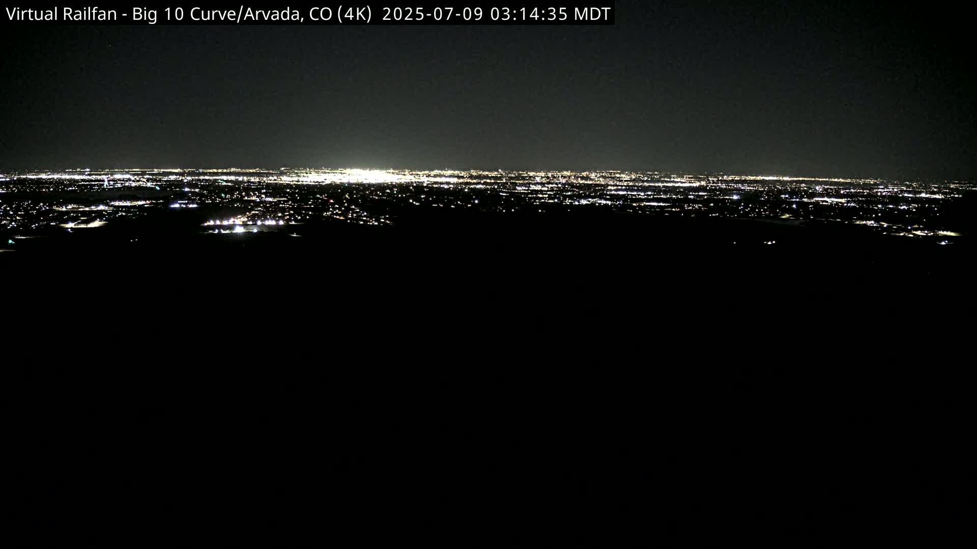Denver Skyline  & Arvada Big  10 Curve Railroad Live Cam - Arvada, Jefferson, Colorado, USA