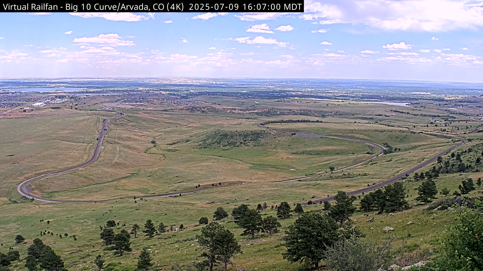Denver Skyline  & Arvada Big  10 Curve Railroad Live Cam - Arvada, Jefferson, Colorado, USA
