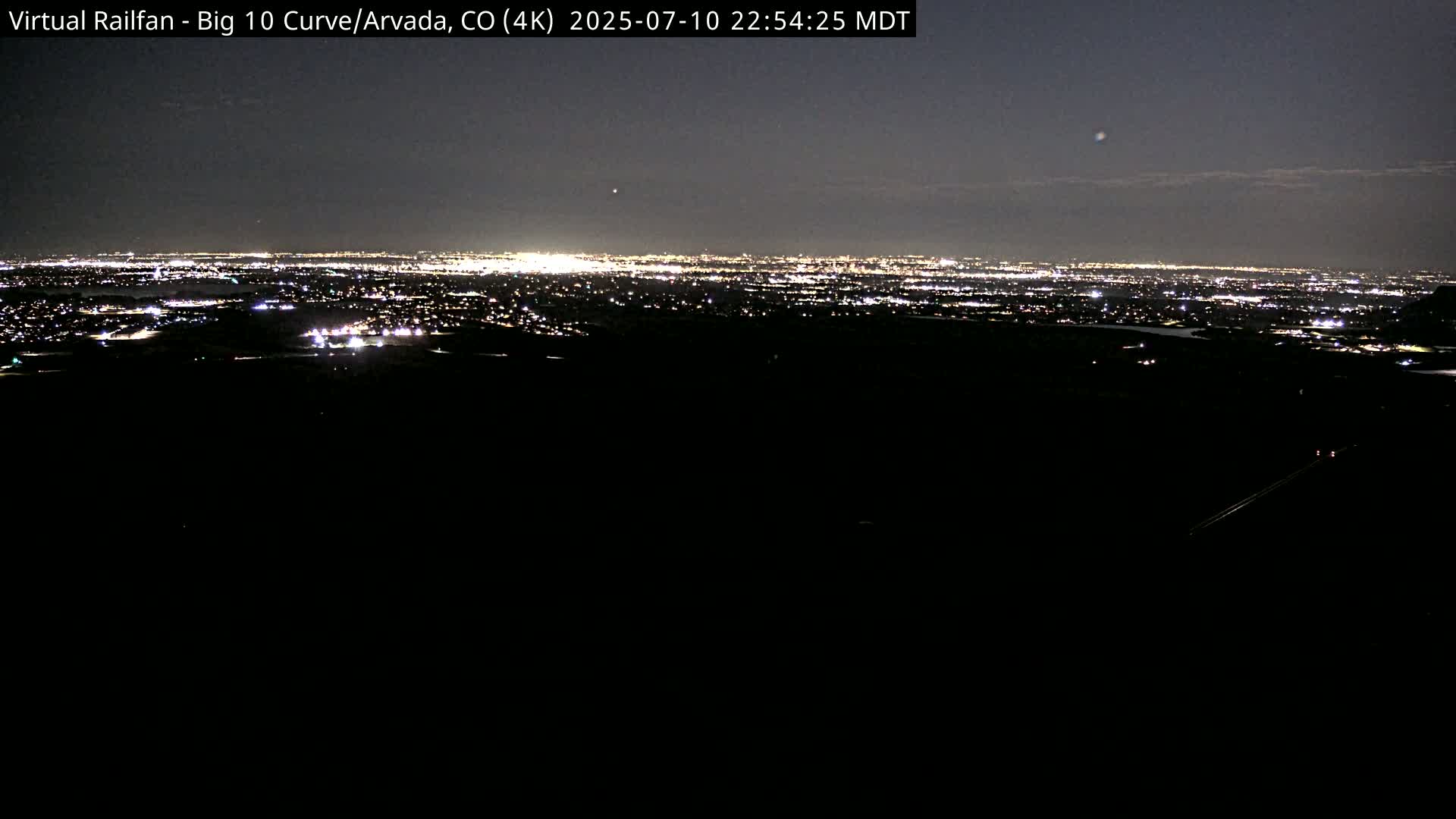 Denver Skyline  & Arvada Big  10 Curve Railroad Live Cam - Arvada, Jefferson, Colorado, USA