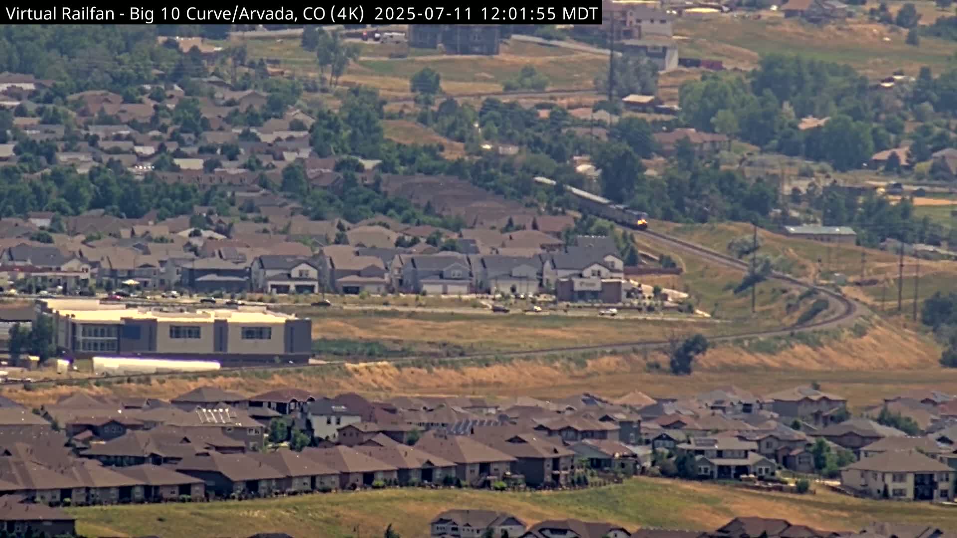 Denver Skyline  & Arvada Big  10 Curve Railroad Live Cam - Arvada, Jefferson, Colorado, USA