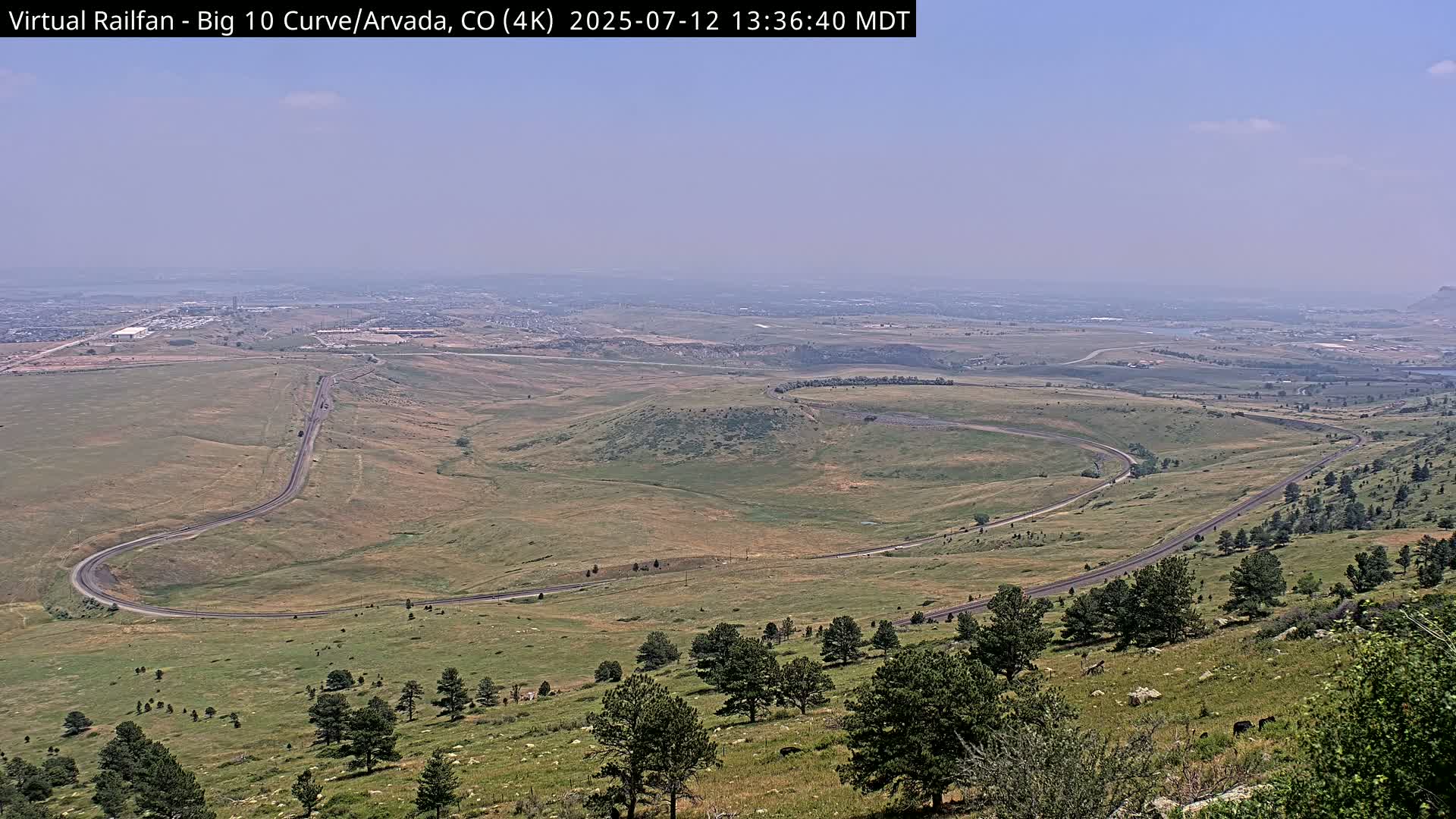 Denver Skyline  & Arvada Big  10 Curve Railroad Live Cam - Arvada, Jefferson, Colorado, USA