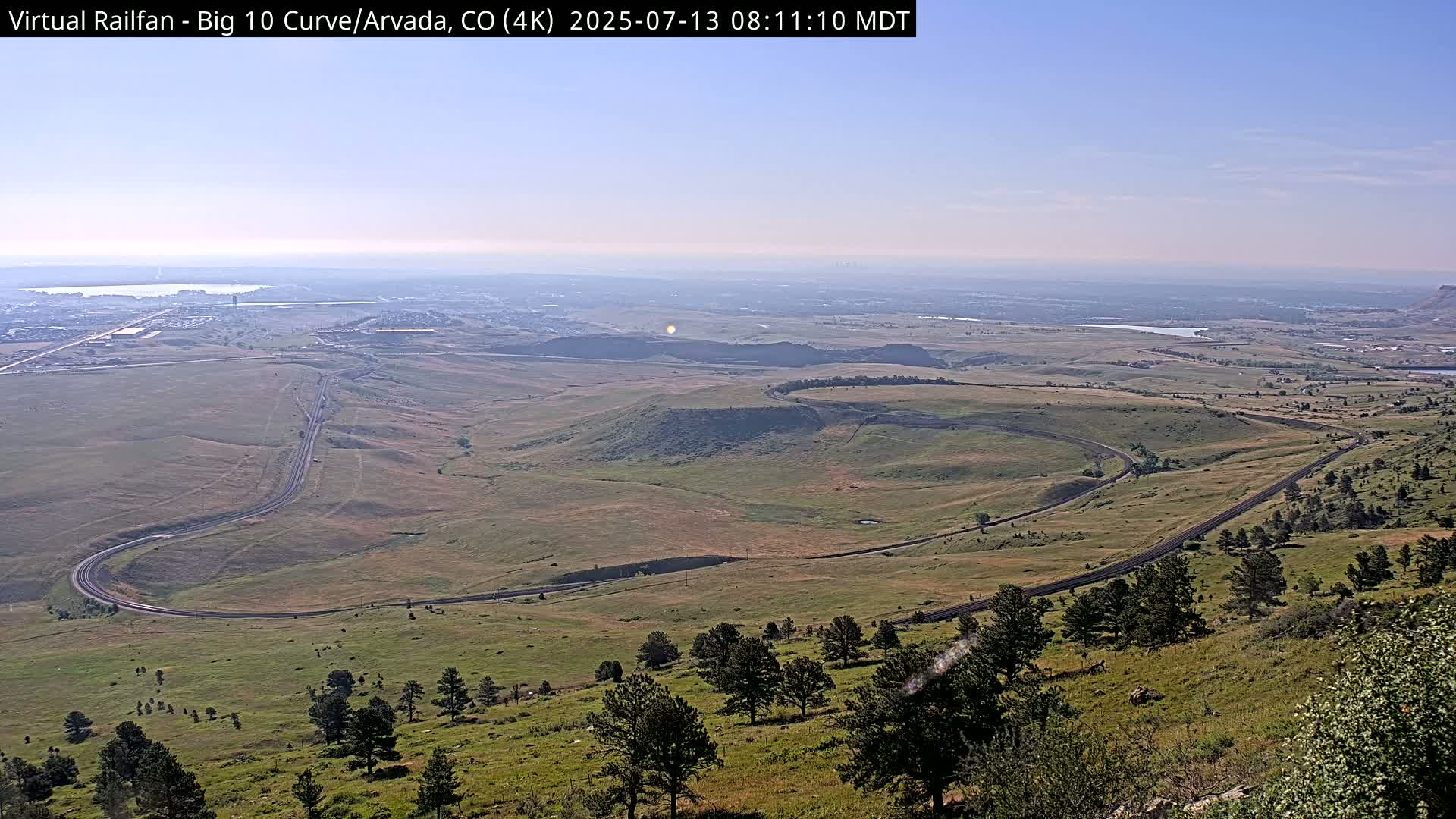 Denver Skyline  & Arvada Big  10 Curve Railroad Live Cam - Arvada, Jefferson, Colorado, USA