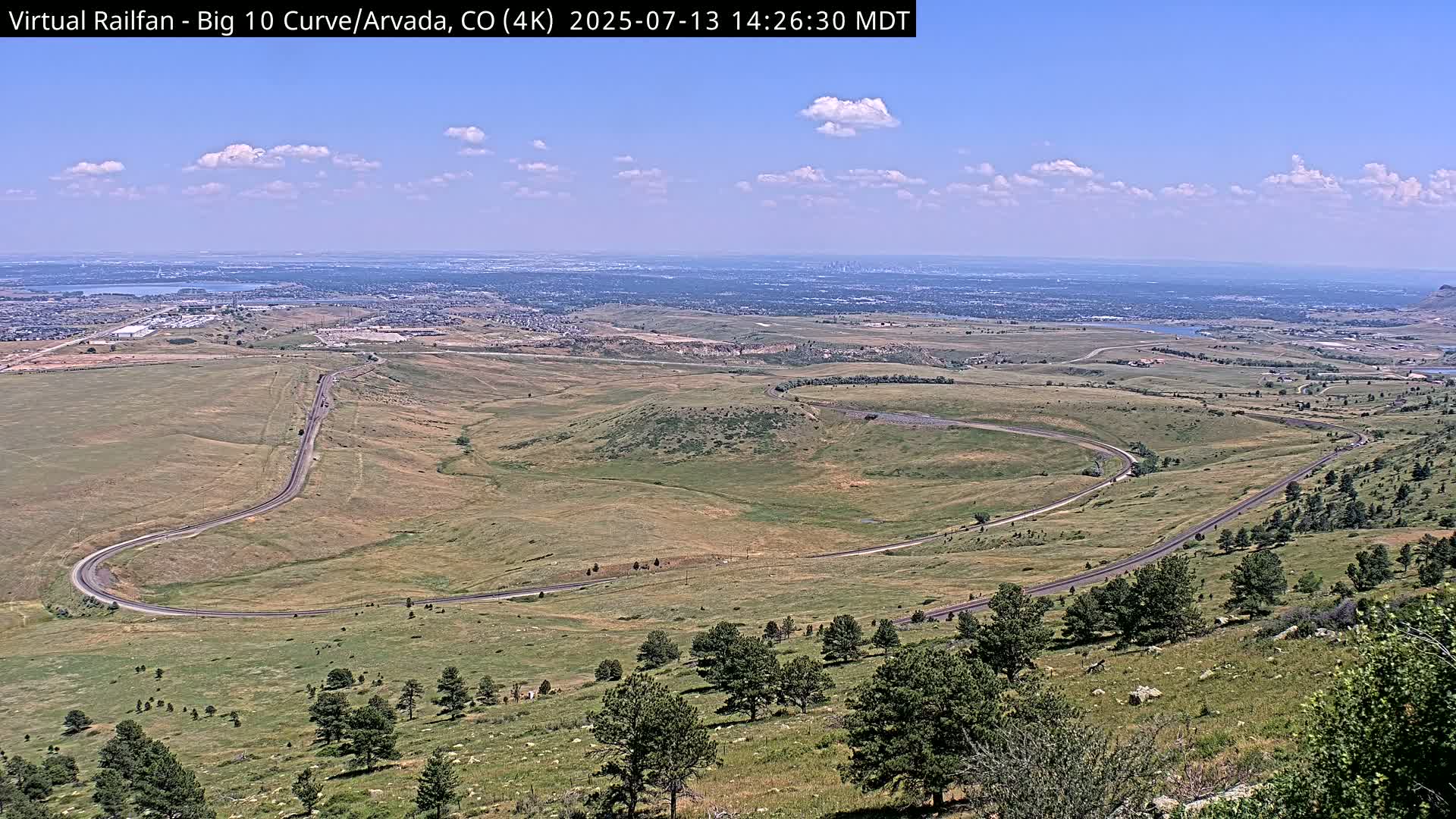 Denver Skyline  & Arvada Big  10 Curve Railroad Live Cam - Arvada, Jefferson, Colorado, USA