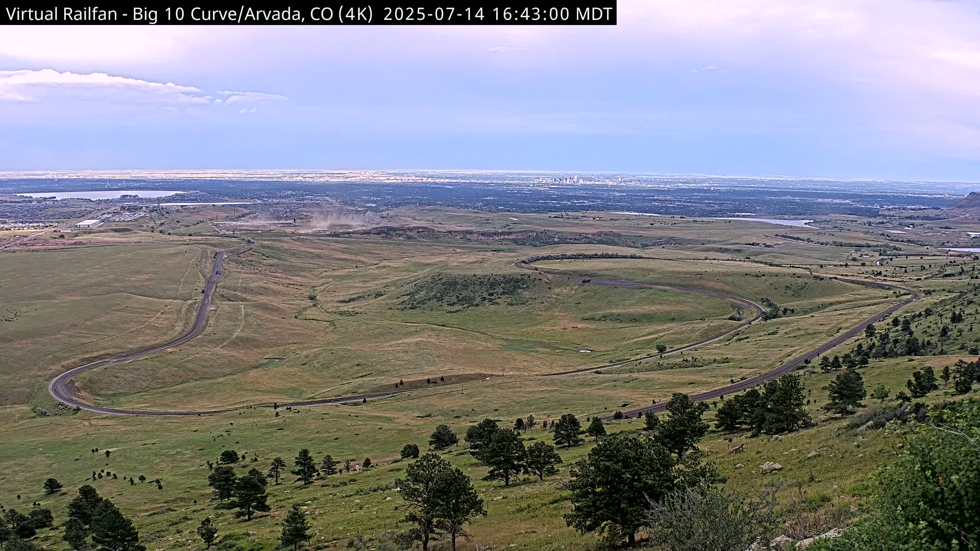 Denver Skyline  & Arvada Big  10 Curve Railroad Live Cam - Arvada, Jefferson, Colorado, USA