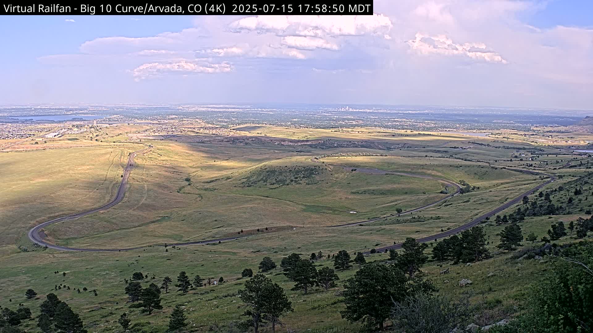 Denver Skyline  & Arvada Big  10 Curve Railroad Live Cam - Arvada, Jefferson, Colorado, USA